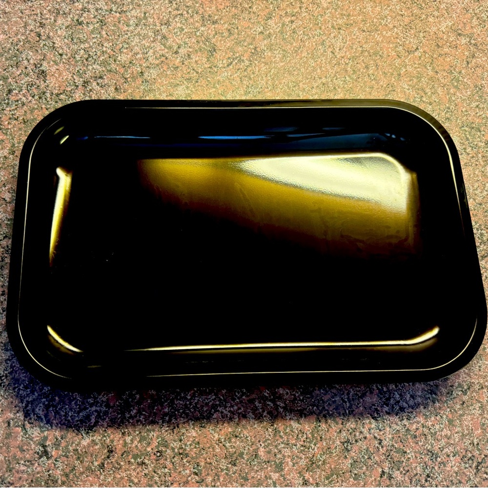 Tobacco rolling plate